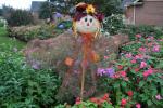 Scarecrow enjoying the garden