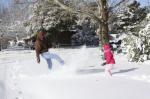 nephew kicks snow at daughter