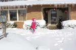 Daughter running in snow