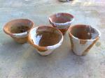 Repaired 4 clay pots!