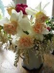bouquet of Rosy Cloud Narcissus, Margarita tulips and Pieris japonica  