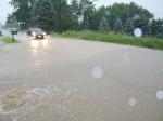 water running across the road