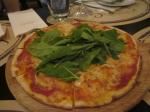 Cheese pizza with arrow leaves