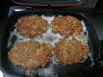 Cooking the patties on an open pressure pan